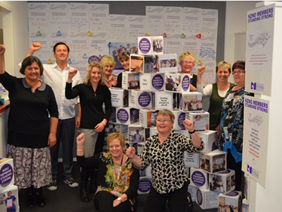 The negotiation team receives a whole wall of your supportive messages before heading into the first day of bargaining