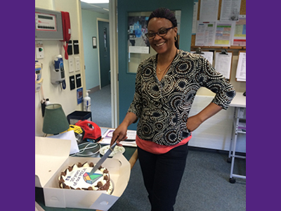 An NZNO midwife cuts the cake at Kenepuru' Hospital's 10th MECA bash.