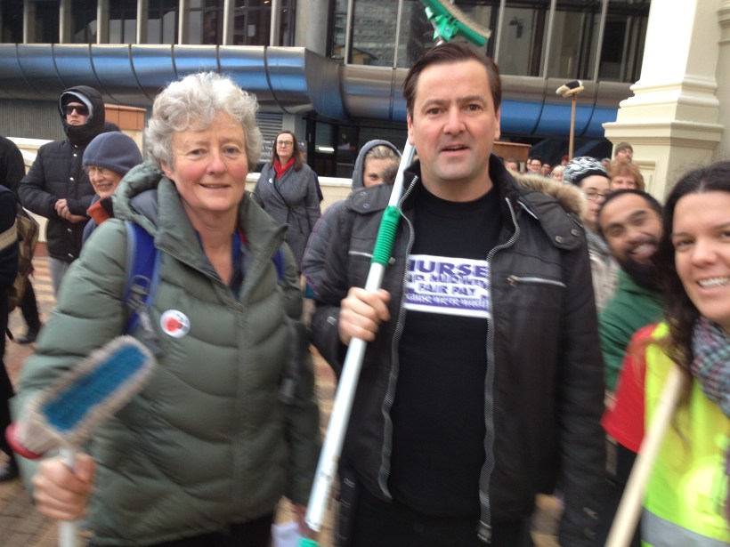 CCDHB delegate Kathryn Fernando (left), NZNO Organiser Danielle Davies (right) and I at the Living Wage “Mop March” for Wellington City Council contract cleaners
